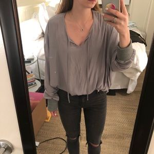 Gray top with sweater cuffs